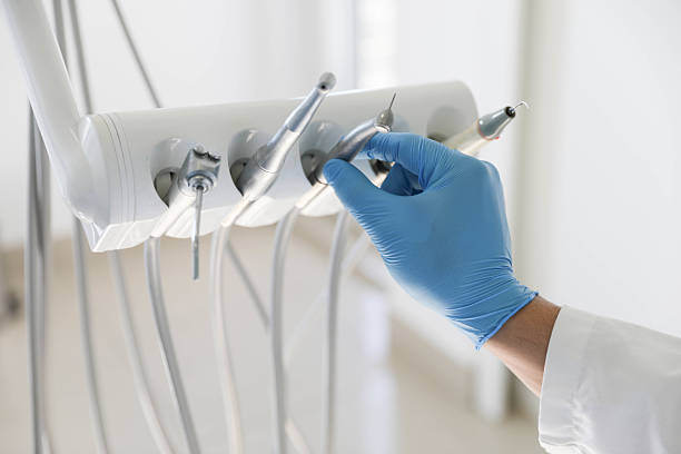 Professional Tooth Extraction technician working in Hays, KS